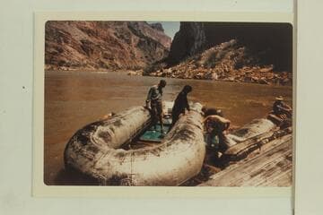 Repairs to baloney below Vulcan Rapid after it had capsized in the big hole