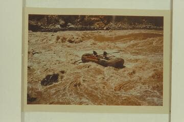 Pontoon No. 1 in Vulcan Rapid. Bruce and Clarke Lium at the oars