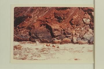 Deck-Boat 2/3rds down Vulcan Rapid after superstructure had let go in the first hole and the motors were dead. The boat ran bow-on