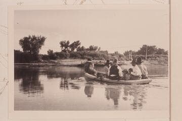 Indians crossing Green River at Ouray. The ferry is at the far shore