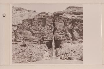 Deer Creek Falls.  The clear lagoon is held in by a low sand bar