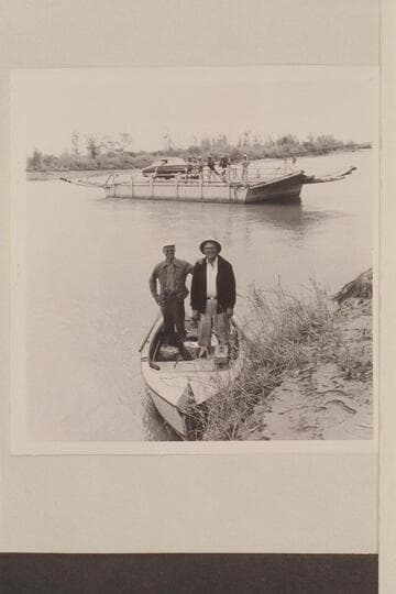 Ed Nichols and Ed Hudson in the 12-ft. outboard "Nancy."  Lower Zacatecas Ferry, Colorado River, about 25 miles above Gulf.  Photo made on return from run to Gulf