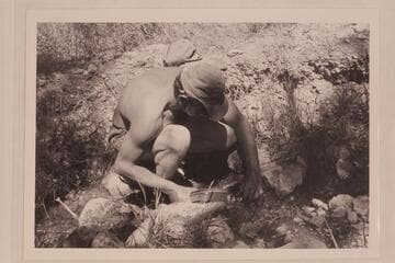 Lug Larsen fills canteen in Alcove Brook