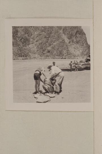 Wrapping the crippled motor; mouth of Travertine Creek