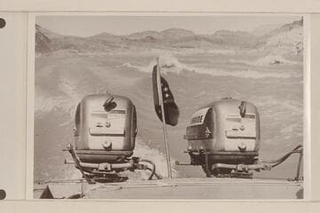 The stern of the "Bootoo."  The wakes of the three boats