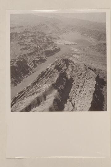 Looking down Lake Mead to right of Iceberg Canyon.  Sandy Point in middle distance.  The silt shows in the water down past Sandy Point