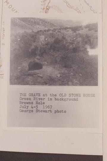 Grave at the old stone house in Brown's hole. The Green River in background