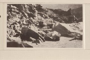 "Glen" and "Boulder" waiting their turn for launching and loading at Lava Cliff Rapids.  The escarpment of lava is above and to the right