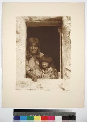 Hopiland, Arizona. Kauowena, the oldest woman in Walpi. There are four generations between the old woman and the child