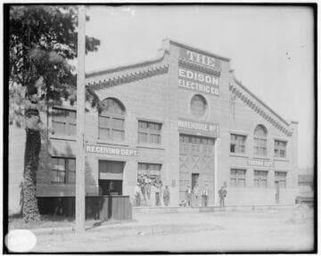 The operating crew standing in front of the Machine Shop & Warehouse No. 1 at Los Angeles #3 Steam Plant
