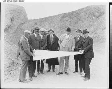 Harry Chandler and others inspect plans for Mulholland Dam