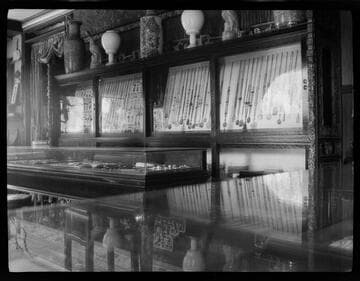 Display cases of jewelry and Asian artifacts in Grace Nicholson's store at 46 N. Los Robles Ave., Pasadena
