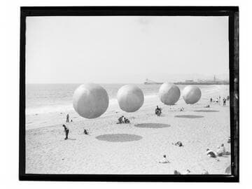 Preparing monkeys and balloons for International Coconut Balloon Derby Contest, Venice