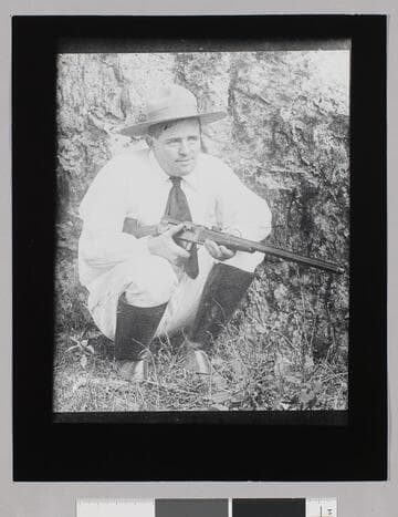 Jack London with rifle