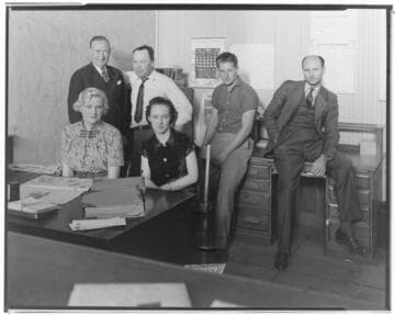 Office staff at print shop with Mr. Smith