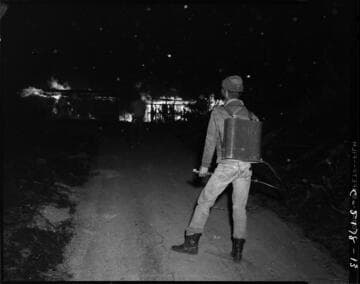 Linemen placing a pole