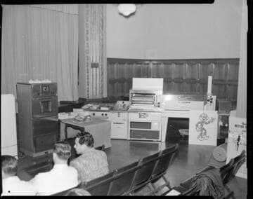 Cooking demonstration in large theater/auditorium setting