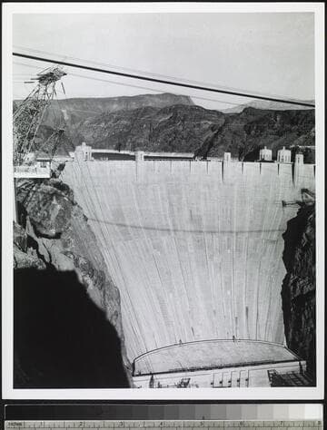 Hoover Dam spilling upstream view overhead showing Lake Mead and dam spilling on Nevada side