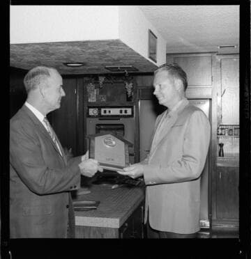 Gold Medallion award being presented to developer for Total Electric construction