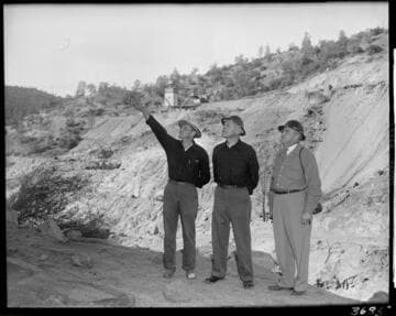 Big Creek 4 construction work: three men planning work at Powerhouse #4 or Dam 7construction site