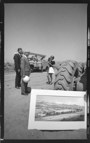 Two men and a lady at the site of future distribution substation