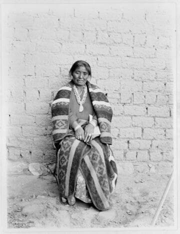 Navaho Indian woman; the daughter of the great chief Manuelito, wearing the finest blanket, jewelry and wampum