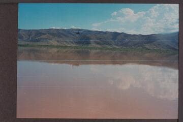 Chuck Rowland flying in above Gods Pocket to check progress of deck boat