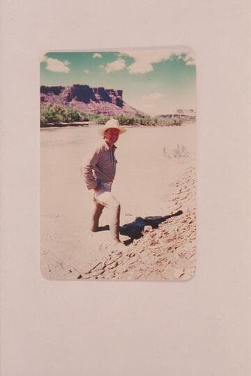 Paul Terry after wading the mud of Paria Creek. Terry traversed the Grand Canyon in 1953