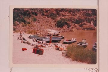 The two prop boats for the Disney Powell picture on the beach for repairs to the glass. The camera boat in back of them and the work boat at their sterns.  Two of the three Smith-Craft at right