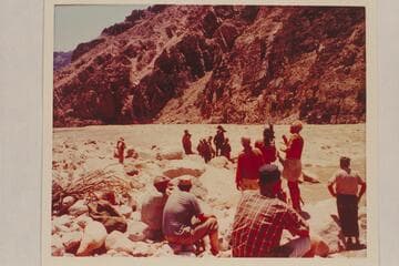 The Powell crew being photographed at Mile 205 Rapid