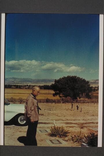 Dock Marston at the grave of Frank V. Goodman.  Galloway graves in background.  Vernal Cemetery