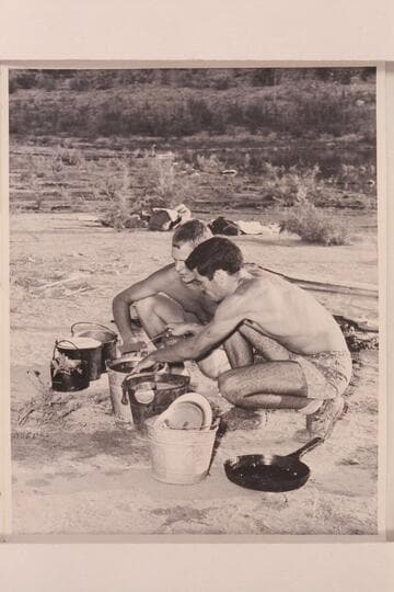 Joe Desloge and Garth Marston wash dishes at Pierces Ferry
