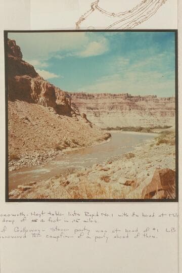 Upstream view of Colorado River in Cataract Canyon from approximately Mile 212.2.  First rapid shows at left.  Greenery in middle distance is at mouth of side canyon which enters river at Mile 213 opposite Spanish Bottom