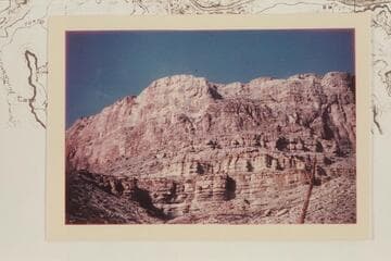 Newberry Butte.  Route:  left talus to right and up chimney in shadow at top