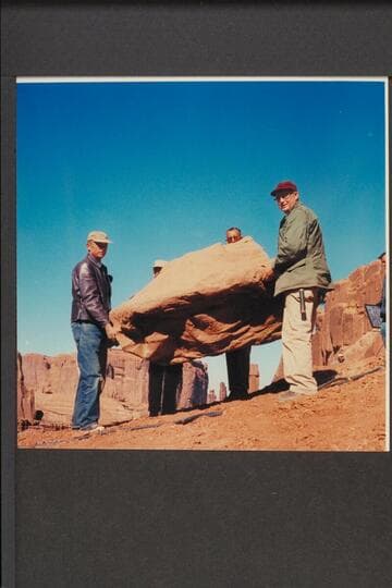 Special effects crew heaving boulder; filming of "The Colorado River Story," Arches National Monument