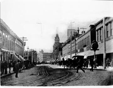 Spring St. South from Temple. Cable and electric cars on the same track