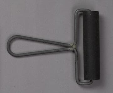 Metal-framed, rubber ink roller