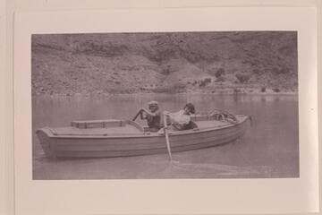 Catherine Pahl and Edith Kolb in USGS boat at Lees Ferry. Photo at Huntington Library