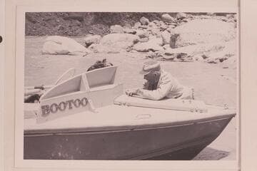 Dock Marston fastening the forward hatch; Mile 24 1/2