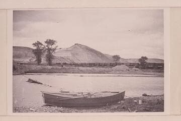 Buzz Holmstrom's boat at Green River, Wyoming below the rail trestle where he started his solo run