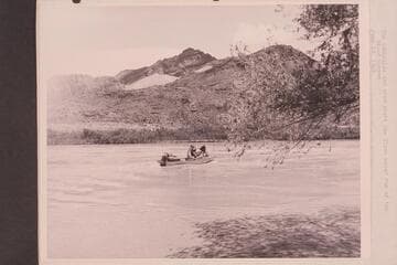 The "Esmeralda" [II] and crew start the first motor run of the Grand Canyon.  Left to right:  Robinson; Taylor; Hudson; Marston.  Edward Hudson is back of his dad