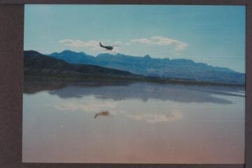 Chuck Rowland flying in above Gods Pocket to check progress of deck boat