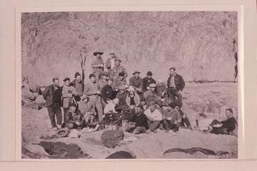 Kneeling at left:  Owen Clark.  Rodin is wearing white shirt and is seated.  LaRue stands third from left.  Woodbury wears dark cap and stands near R. [right?]  Dodge is seated in back and wears white cap, second from R.  Brandon is extreme right
