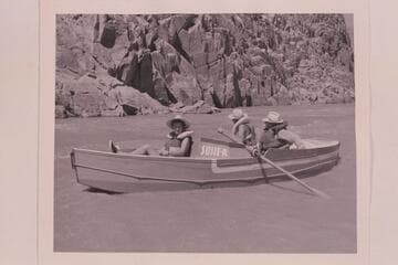Skiff developed by Reilly for Grand Canyon cruising.  Susie and Pat Reilly with Paul Terry; approximately Mile 105