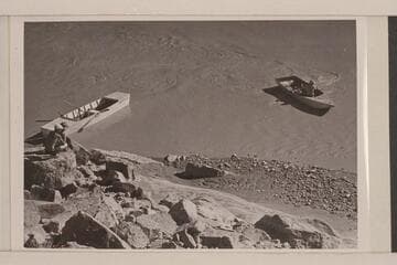 Steps lead to old workings on bar on Colorado. Nevills' punt and one 15 foot folding skiff appear in photo