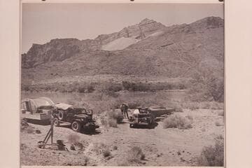 Hulls arriving at Lees Ferry; Jordan and Sanderson stand in middle distance