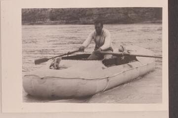 Amos Burg in "Charlie."  Green River, Wyoming.  Raining