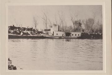 The motorboat "IOLA" operating on the lower river.  Tied up at Ehrenberg
