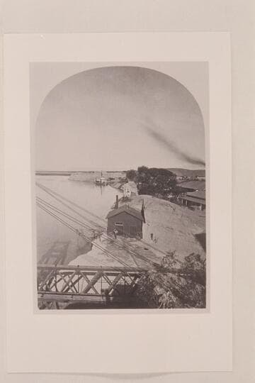 Southern Pacific rail bridge at Yuma. The "GILA" is moored at the bank above the bridge