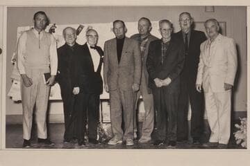 Gay Stavley, Dock Marston, Emery Kolb, Jim Jordan, Bill Belknap, Elwyn Blake, Ed Hudson and Harry Aleson at Emery Kolb's 85th birthday party